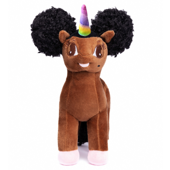 Plush toy resembling a unicorn with black hair and a rainbow horn on a white background